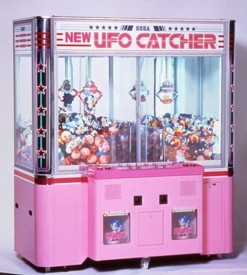 Macchine a gru con artigli Fun Macchine per catturare gli UFO installate nei dipartimenti